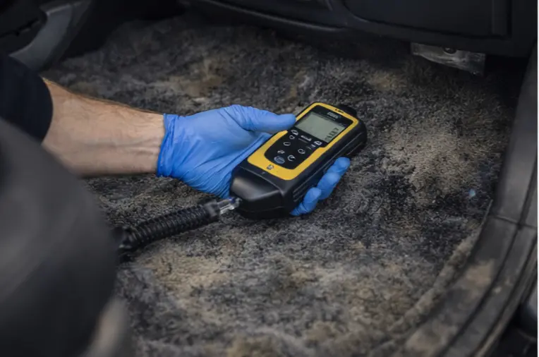 Vehicle Mold Remediation Services 2 “Vehicle mold inspection using professional moisture detection equipment to identify mold growth in car carpets.”